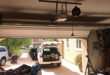 Garage door fully realigned and working smoothly after off track repair in Cupertino