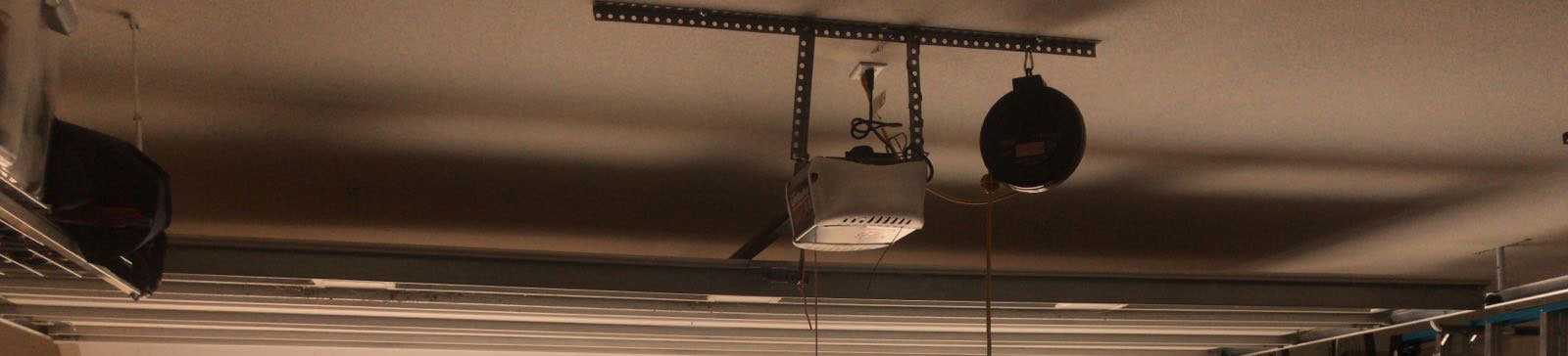 Garage door fully realigned and working smoothly after off track repair in Cupertino
